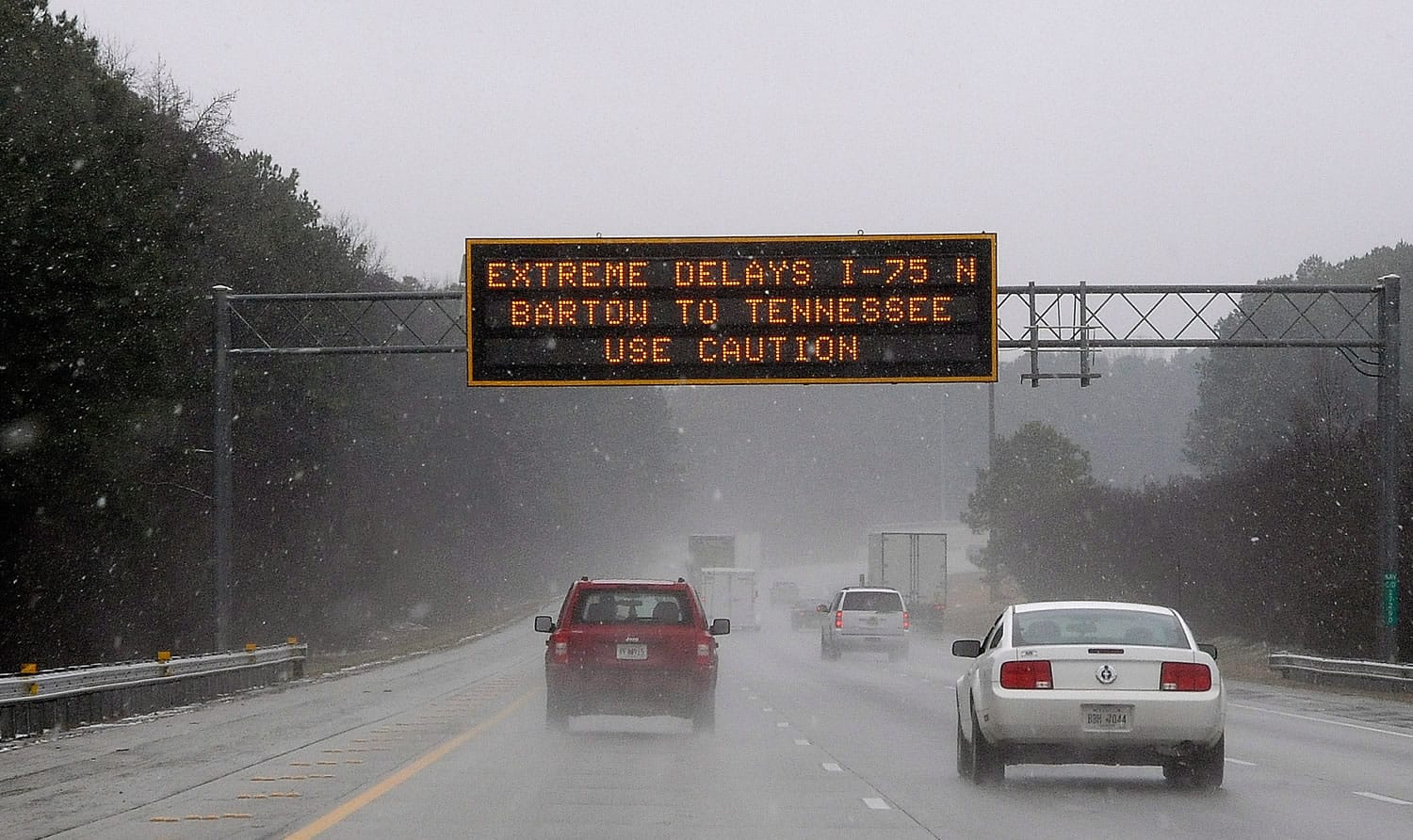A Georgia transportation sign warns motorists on Interstate 75 on Tuesday in Kennesaw, Ga., about 20 miles north of metro Atlanta.