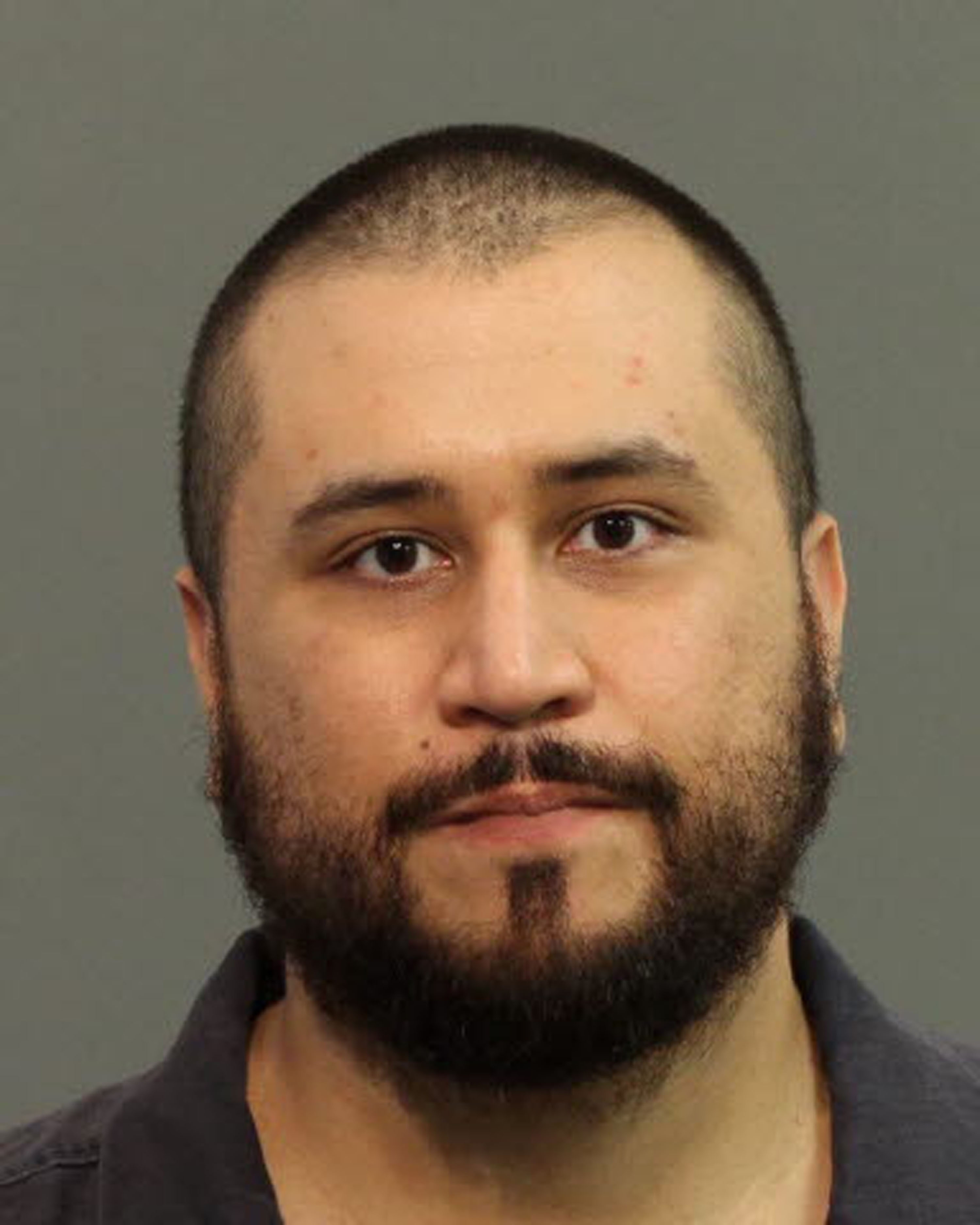 George Zimmerman after being booked into jail today in Florida.