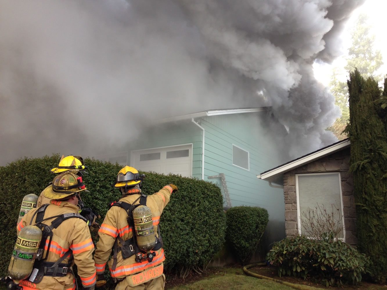 Firefighters have contained a blaze at a house in Camas that was reported as starting in the living room.