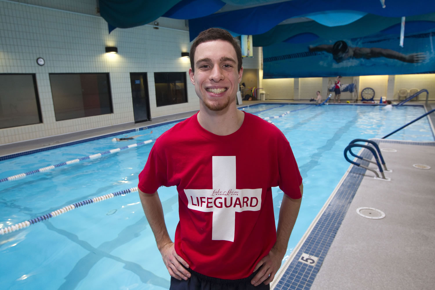 Carter Coval, a lifeguard at Lakeshore Athletic Club, saved a boy from drowning Friday night.