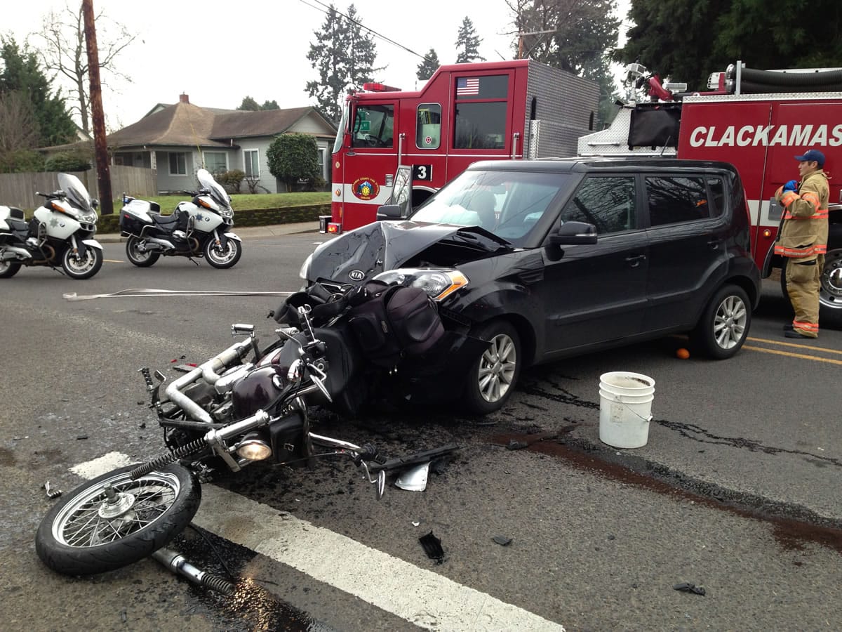 A Ridgefield woman was cited for careless driving and failing to yield the right of way after her vehicle collided on Friday with a motorcycle in Milwaukie, Ore., according to police.