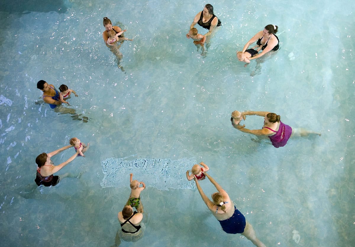Patrons of the Firstenburg Community Center get a work out during an aquatic fitness class. The pool will be open for free on Nov. 21.