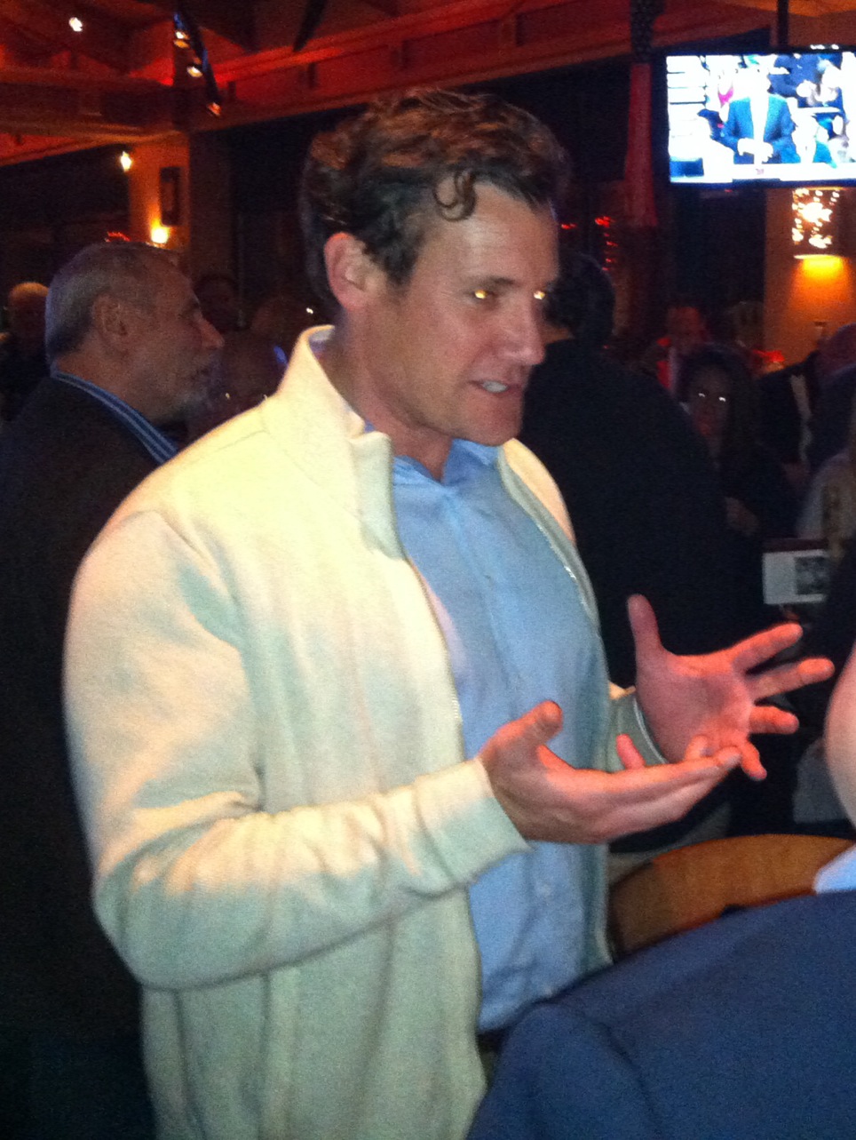 Vancouver Mayor Tim Leavitt talks with supporters at his election night party in Vancouver.
