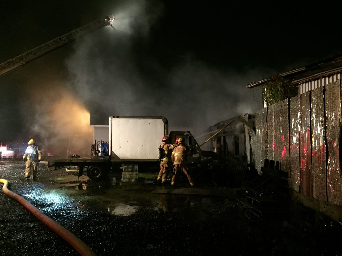 Firefighters attacked a blaze at a Woodland auto repair shop early this morning.
