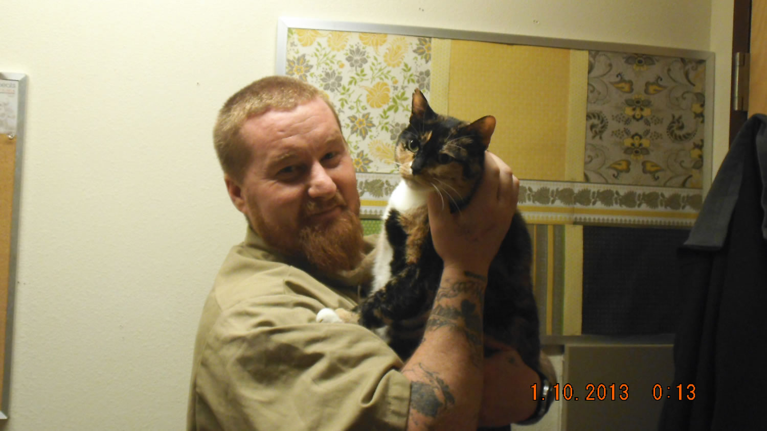 Photo courtesy of Larch Corrections Center
James Resop, an inmate at Larch Corrections Center, in Yacolt, is among the handlers in a cat adoption program. The effort, which started in 2012, involves volunteers training the offenders to care for the cats. After the cats are trained and socialized, they are placed for adoption.