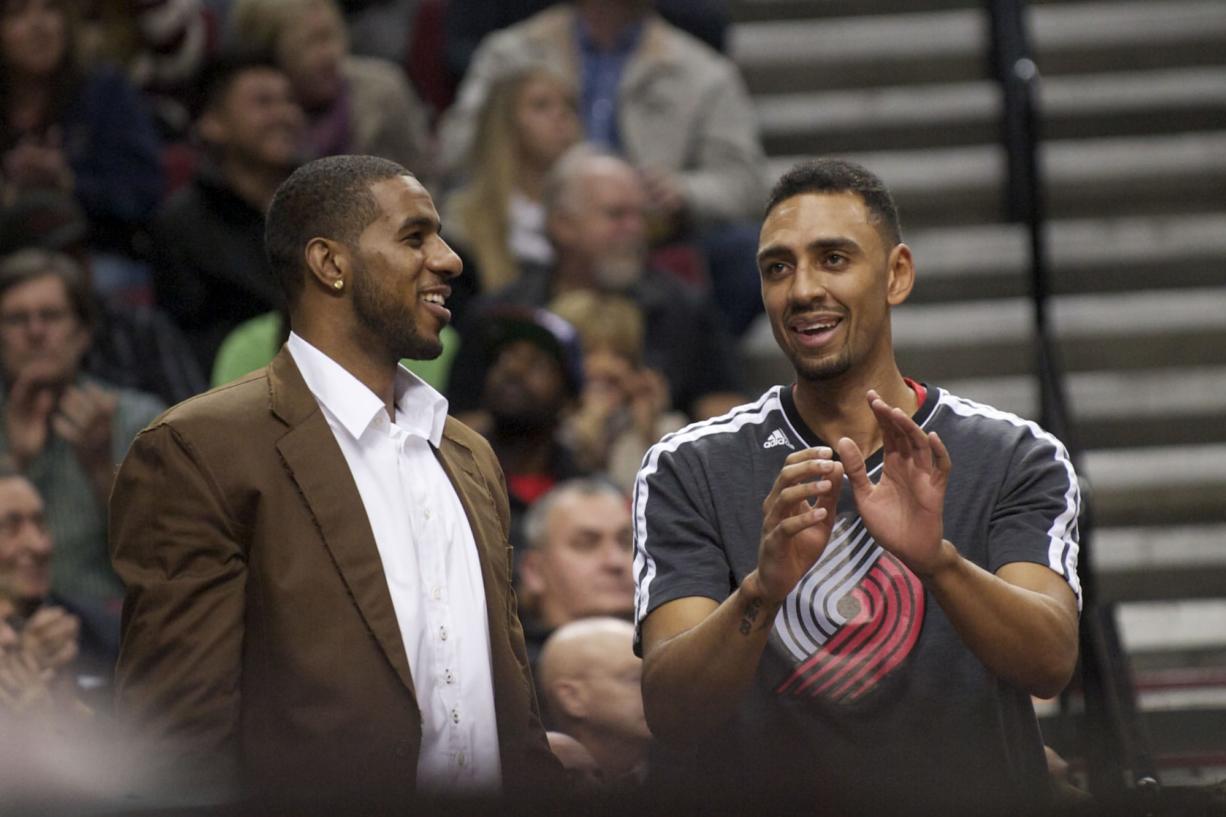 Jared Jeffries, right, talks with LaMarcus Aldridge, during a game in December.