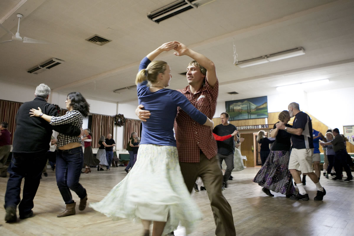 Russell Johnson and Molly Macdonald contra dance at the Hazel Dell Grange in December.