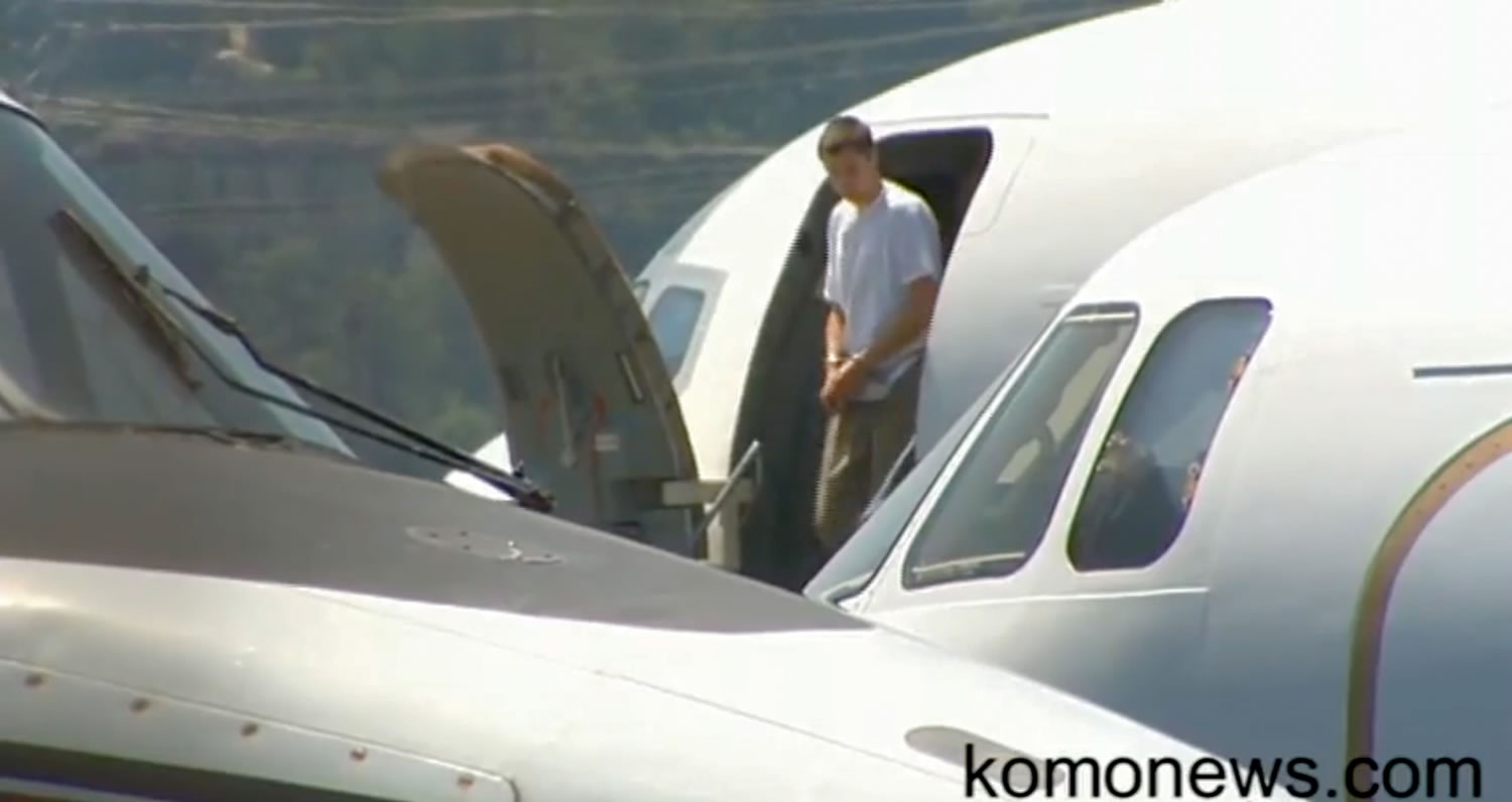 Files/KOMOnews
Colton Harris-Moore disembarks from an airplane as he arrives at Boeing Field in Seattle in July 2010.