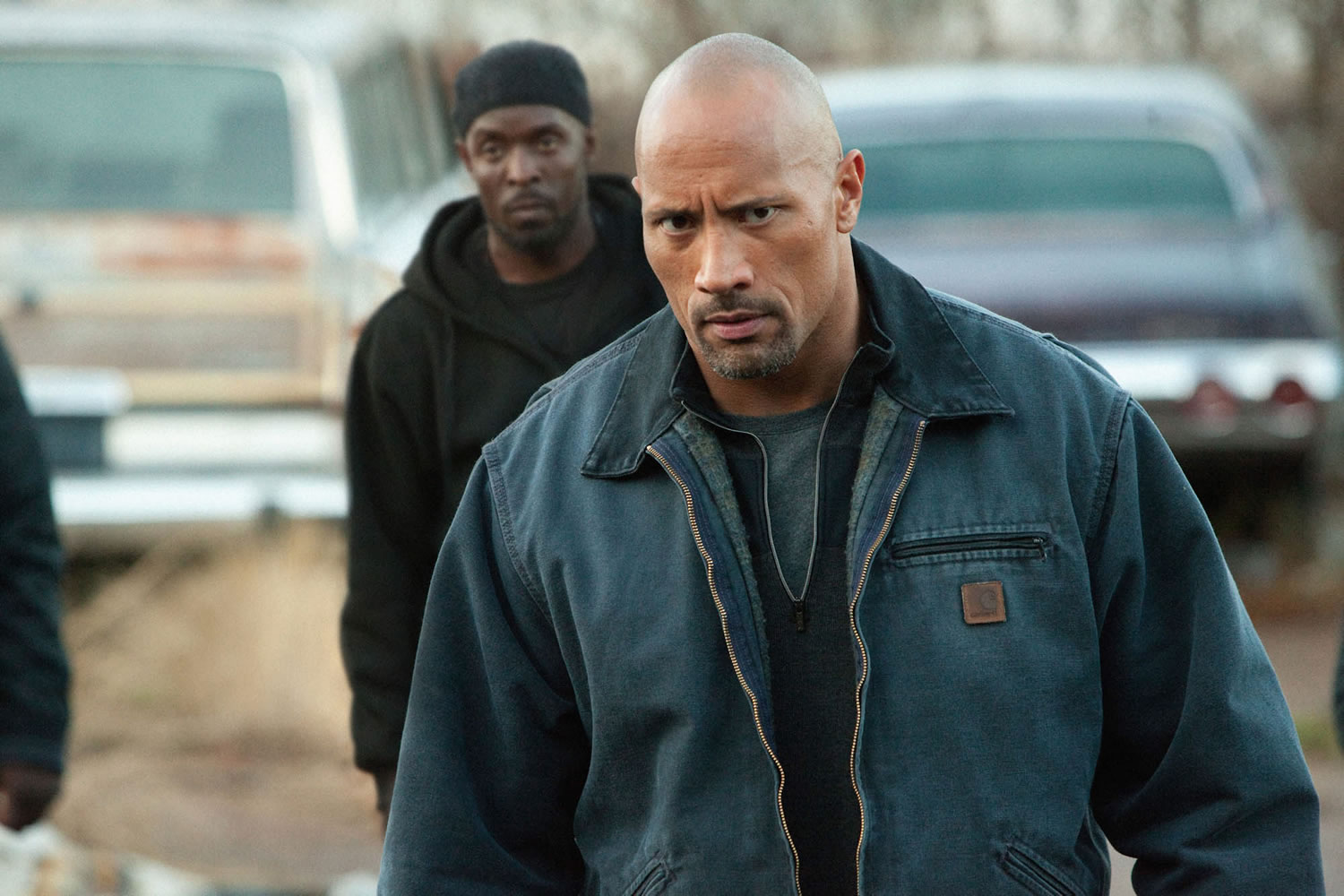 Dwayne Johnson, right, stars in &quot;Snitch.&quot;