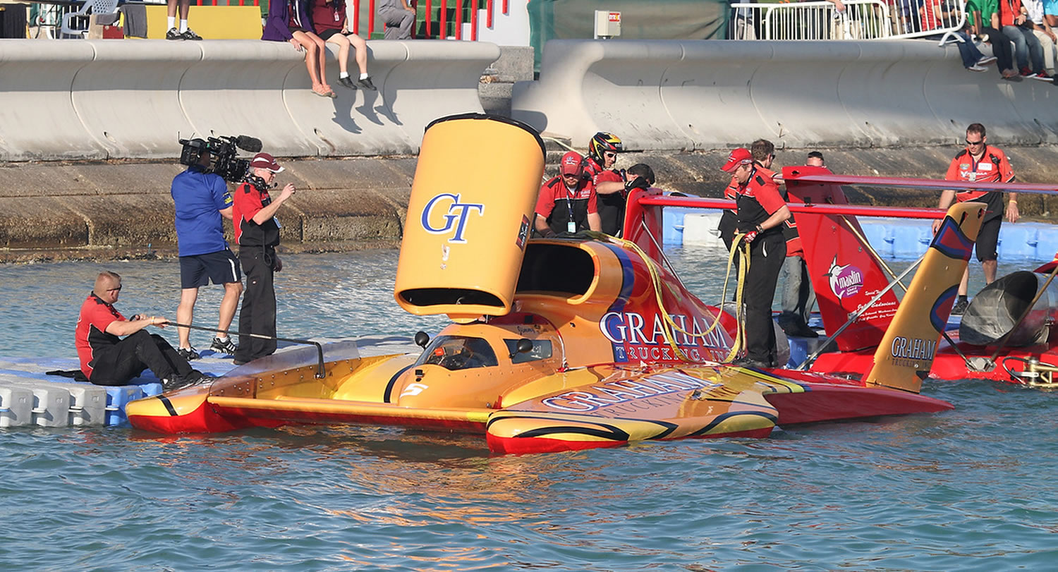 Nelson Holmberg and crew get the Graham Trucking hydroplane ready for competition in Qatar.
