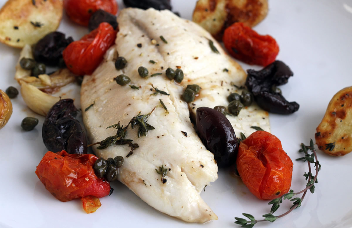 Mild-flavored tilapia is a forgiving ingredient and goes well with kalamata olives, tomatoes and fingerling potatoes.