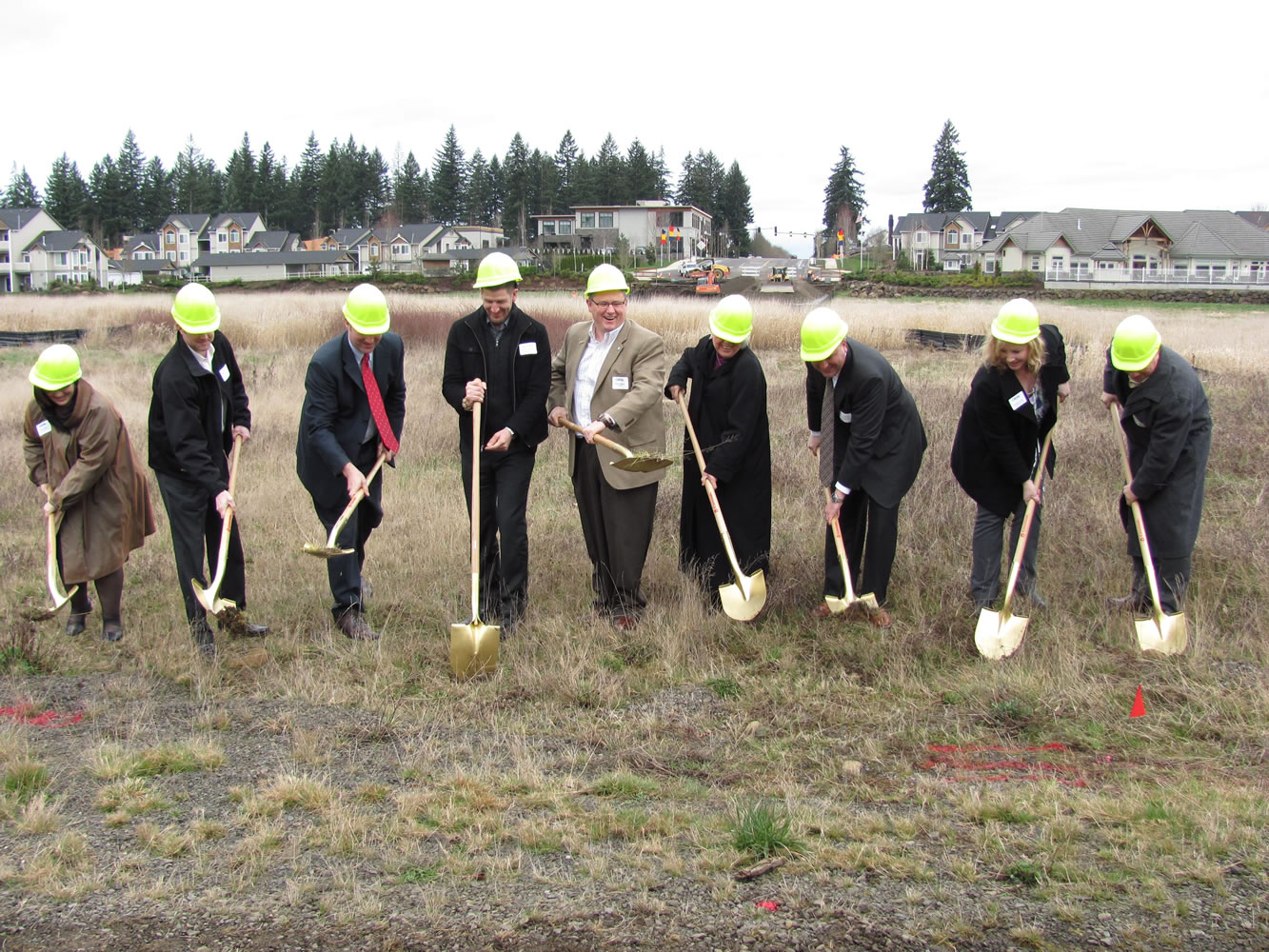 Camas Mayor Scott Higgins (center) is joined by a handful of city, county and state officials during the groundbreaking ceremony for the Northwest 38th Avenue and Southeast 20th Street extension project this afternoon. The $4.8 million project will extend Northwest 38th Avenue approximately two-thirds of a mile west to to 192nd Avenue.