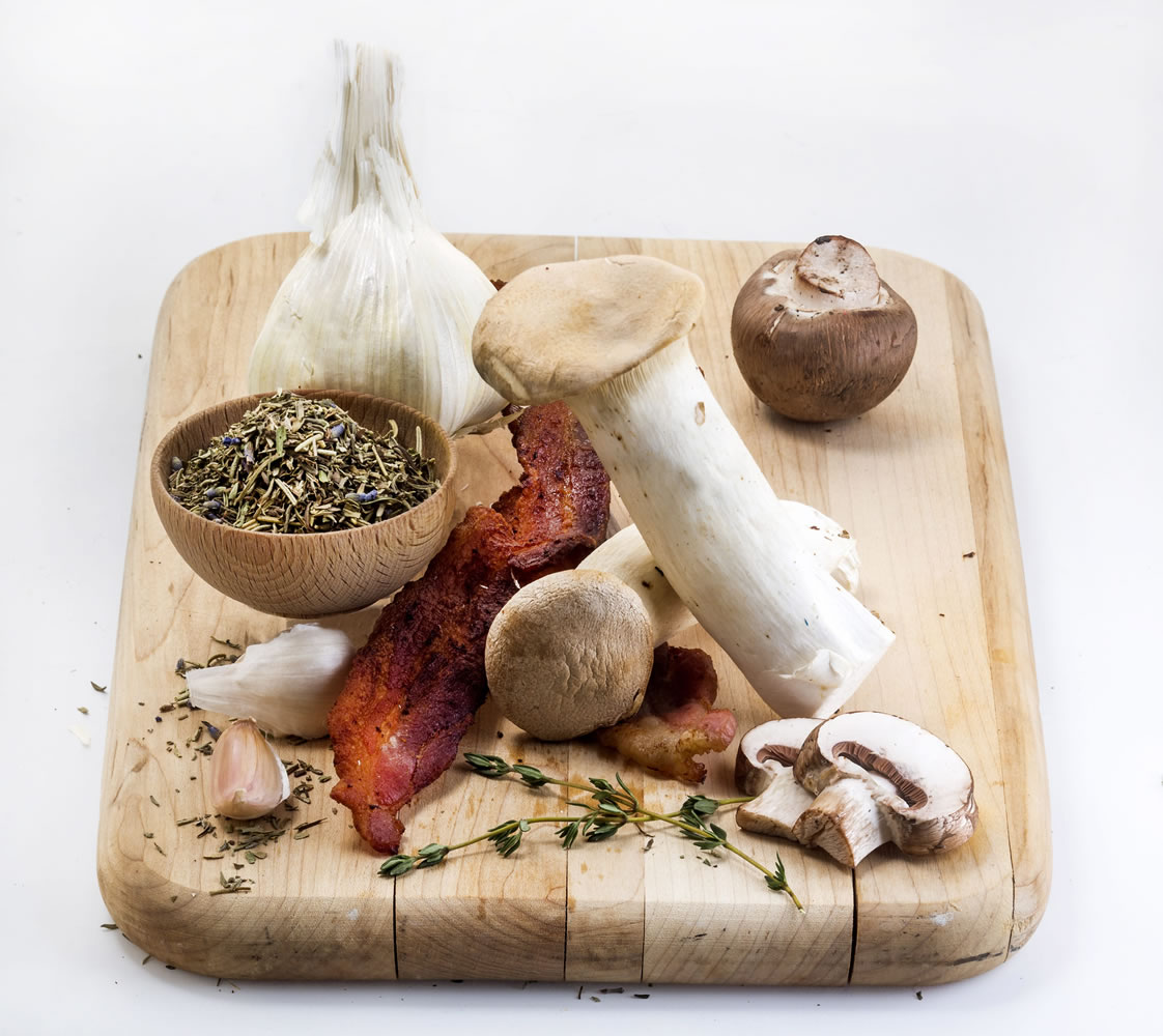 Mushrooms, bacon, garlic and herbs will transform a stew can take on a French twist.