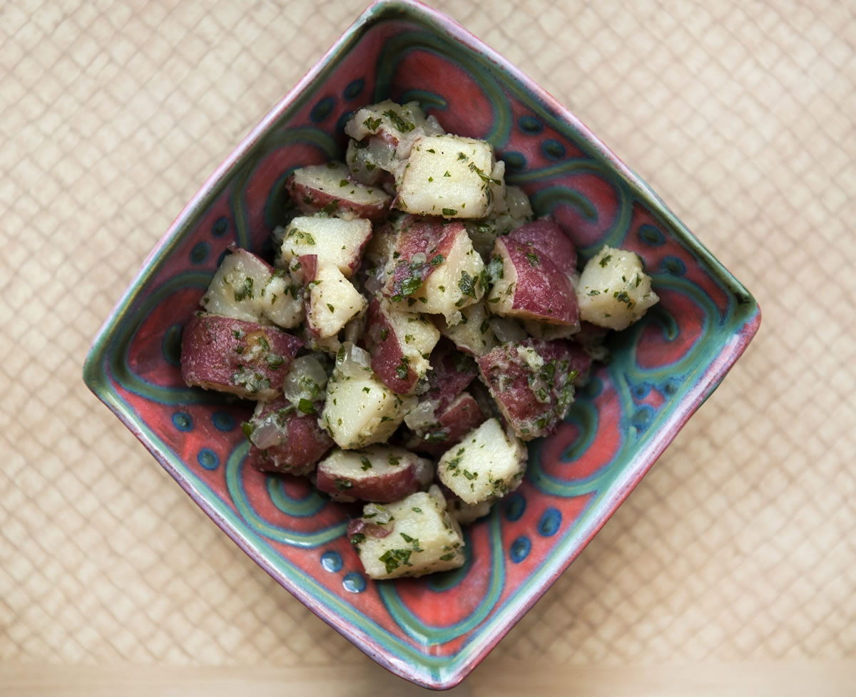 You don't need many ingredients for great potato salad: just good potatoes, fresh herbs, and flavorful vinegar and oil.