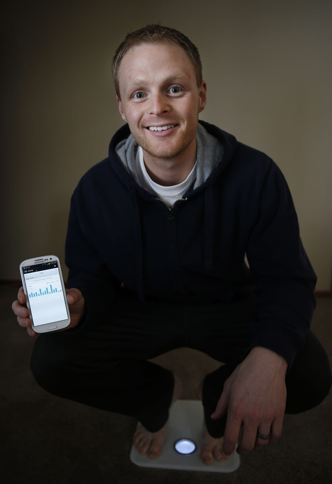 Jared Sieling of Maple Grove, Minn., keeps close track on his health and fitness through electronics.