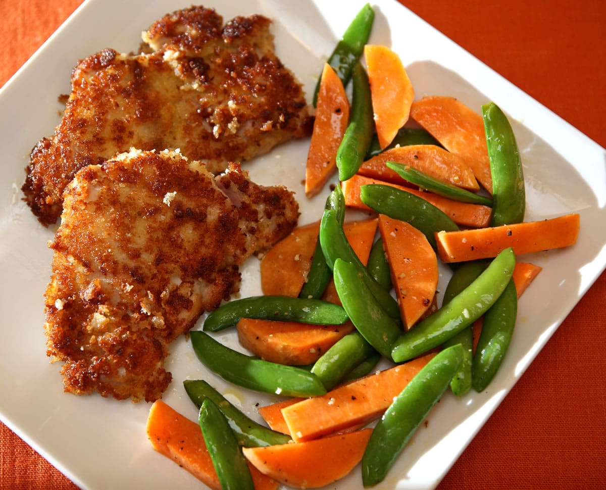 Panko bread crumbs give a golden crust to boneless, skinless chicken thighs while horeradish gives the taste a bit of zing.