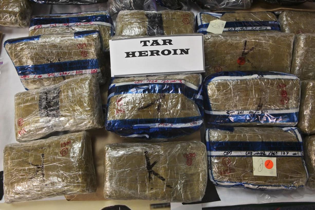 Mexican tar heroin seized in drug raid operations is seen in California.
