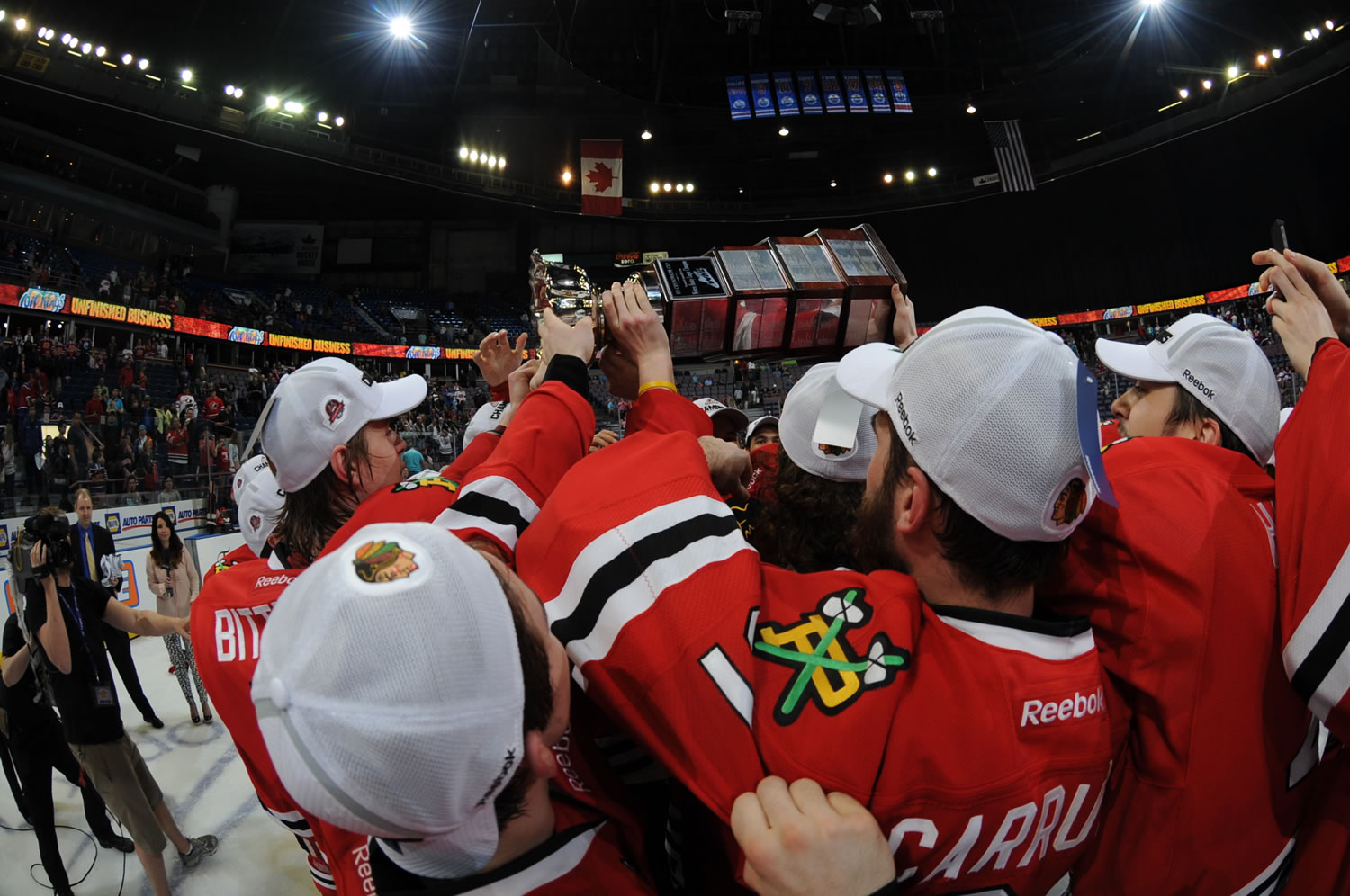 The Portland Winterhawks hoist the Ed Chynoweth Trophy as champions of the Western Hockey League after defeating the Edmonton Oil Kings 5-1 in Game 6 on Sunday in Edmonton.
