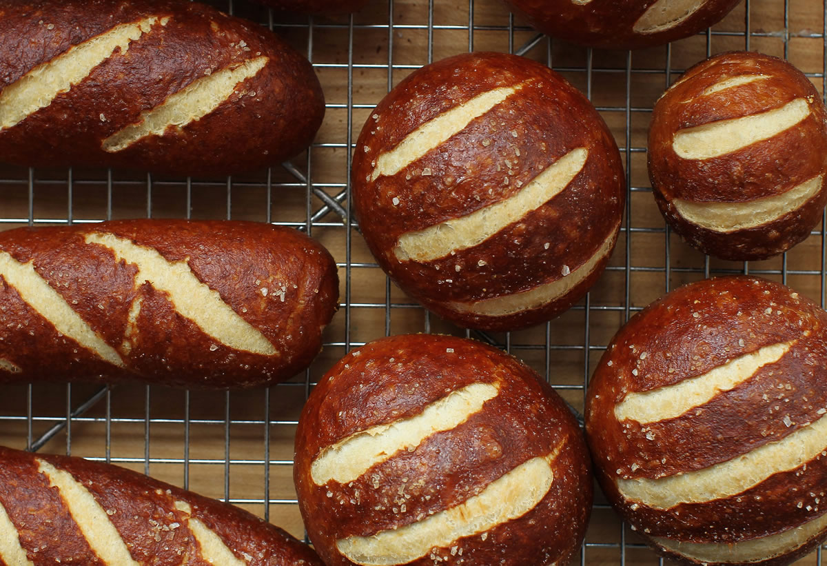 While the innards of a sandwich get the most attention, stacking them inside a strikingly contrasted pretzel bun doubles the pleasure.
