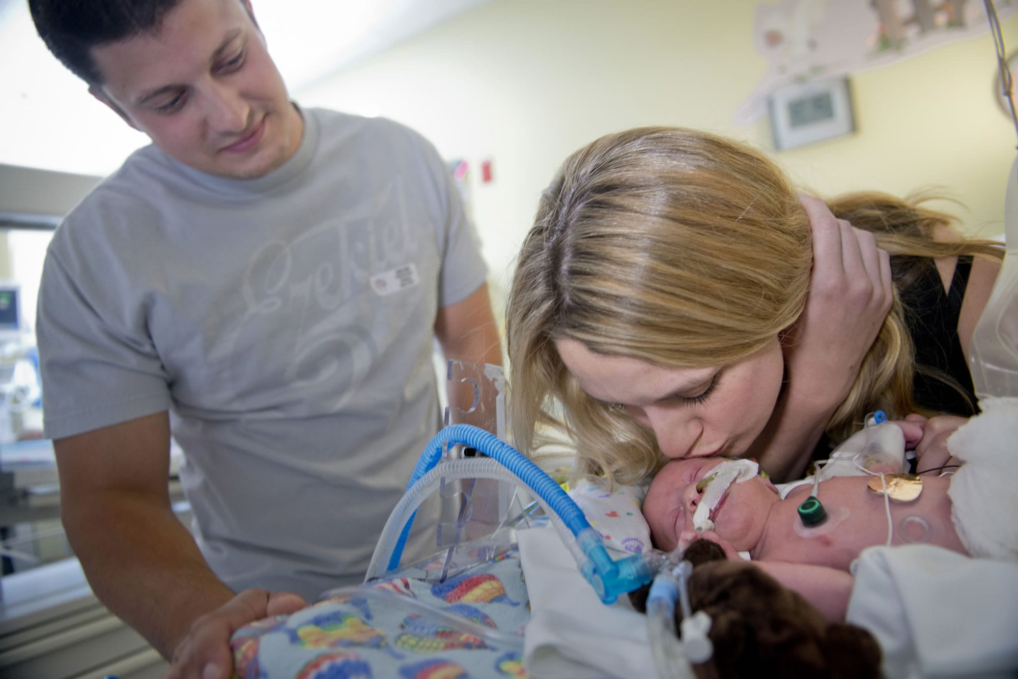Annie Bollinger and Nick Silveira visit their 5-day-old son, Carter Silveira, in the NICU at Sutter Memorial Hospital in East Sacramento, Calif., on May 9.