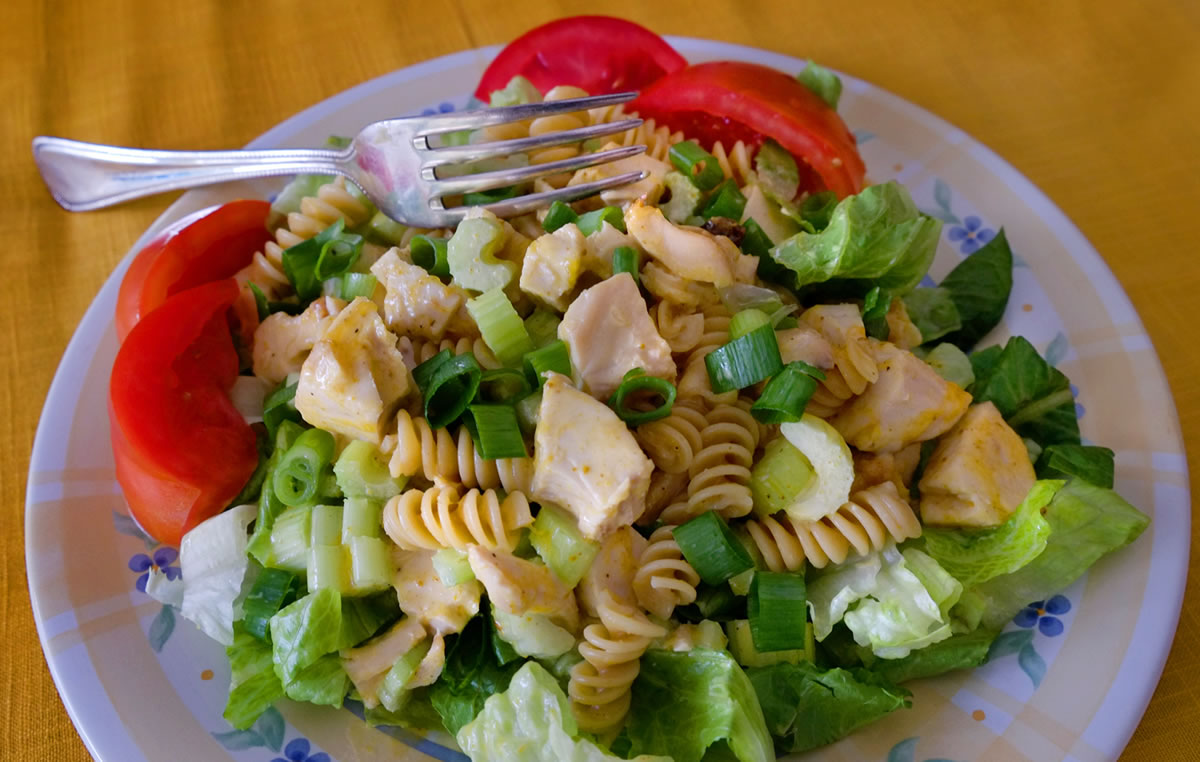 Roasted chicken and pasta top this easy-to-make salad.