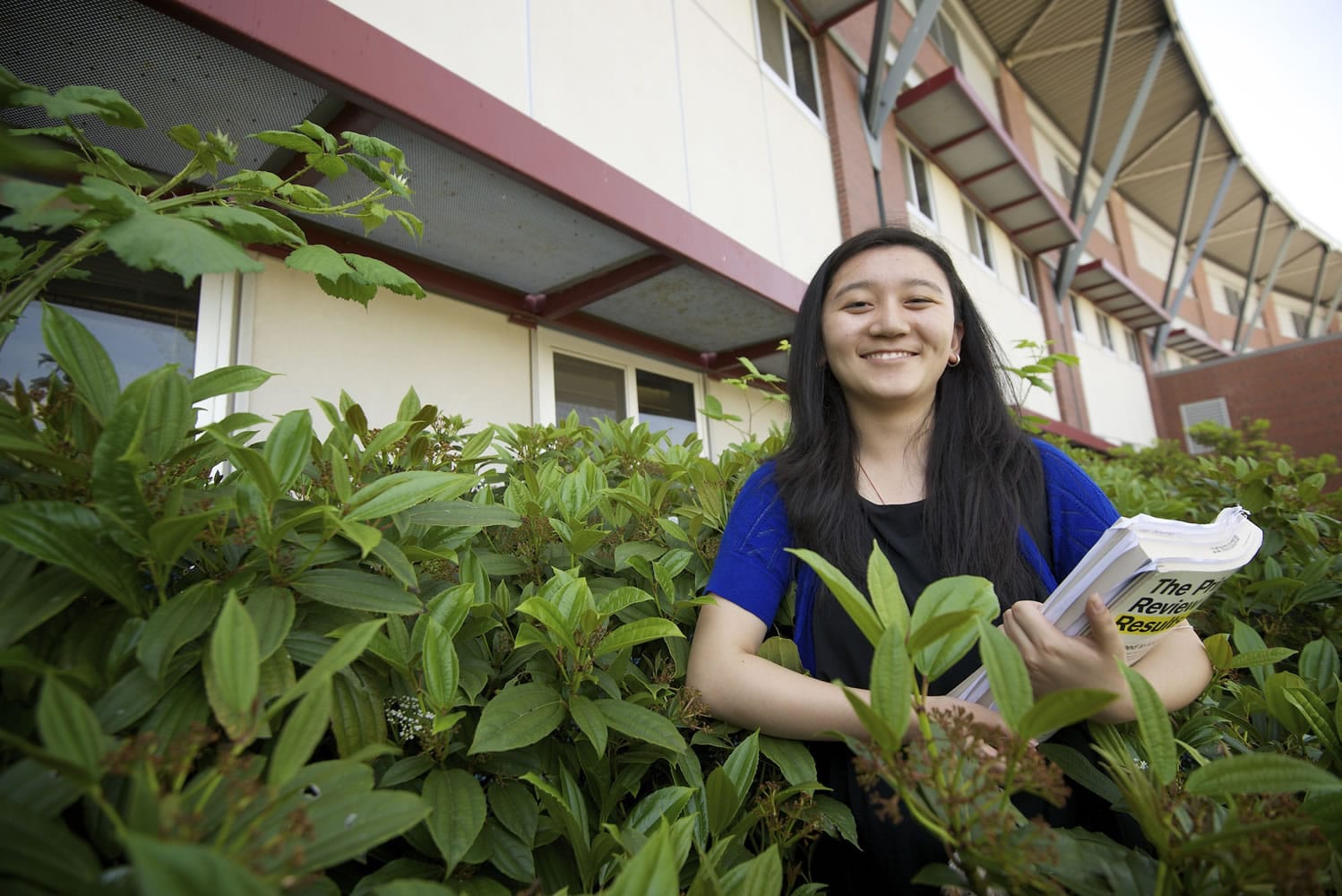 Tenzin Lama, 19, a graduating senior at Camas High School, stands outside the school Friday May 10, 2013. Lama emigrated to the United States from Tibet and wants to study medicine, with her goal being to help underserved parts of the U.S. Friday May 10, 2013.