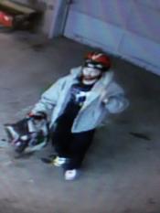 Police are asking for help in identifying this man, suspected of burglarizing an auto repair shop last month.