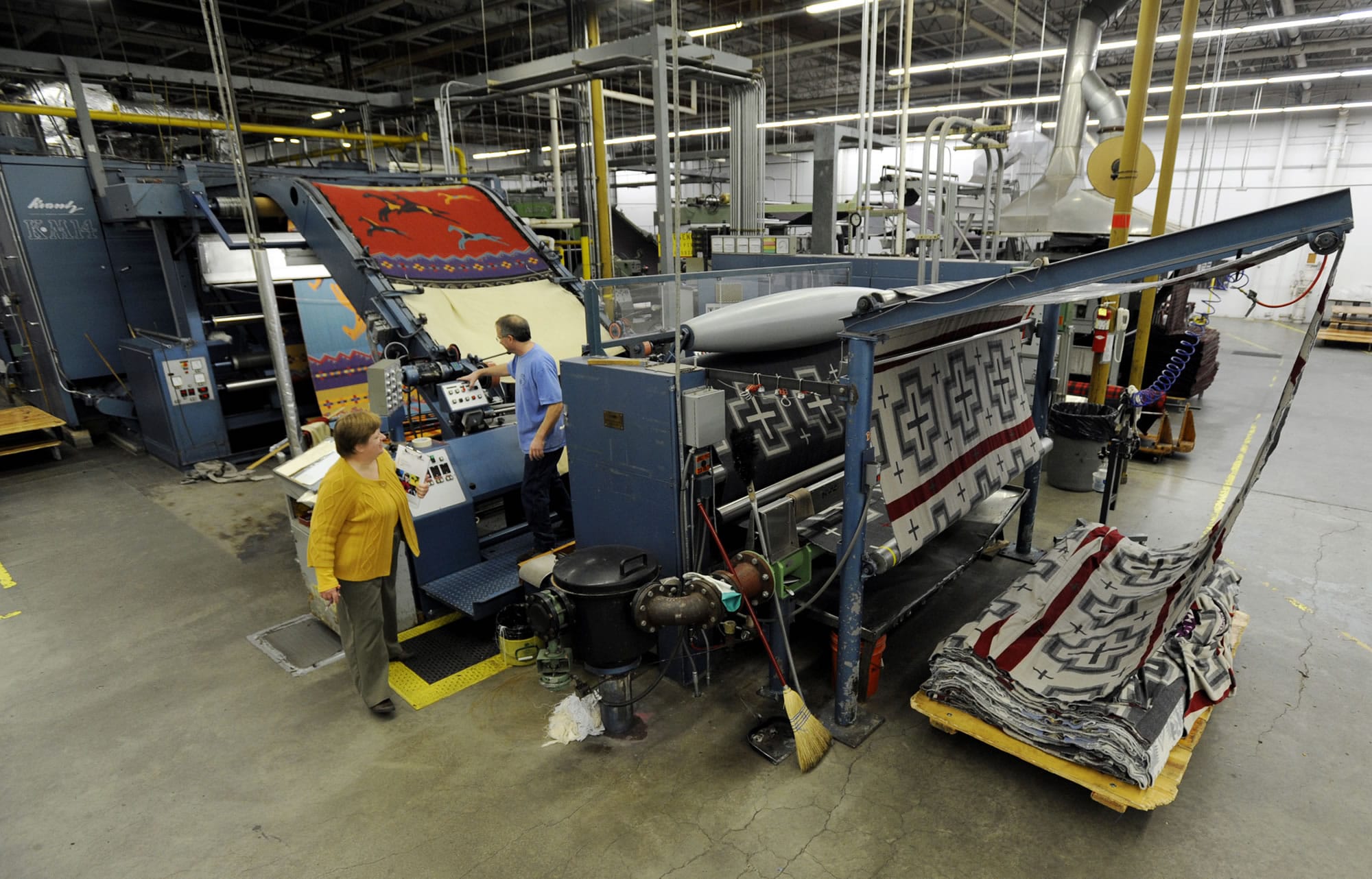 Employees work on the napping machine at the Pendleton Woolen Mills textile mill in Washougal in November.