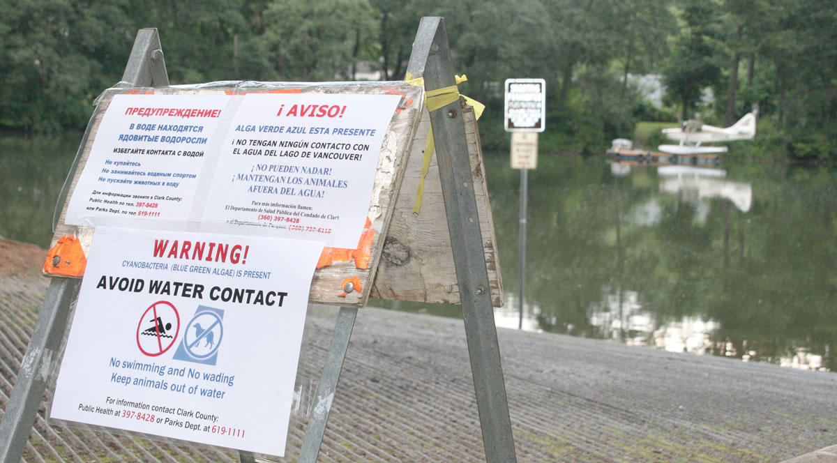 Signs posted at various entry points around the contiguous Lacamas and Round lakes in Camas warn people to avoid contact with the water. On Friday, Clark County Public Health announced that blue-green algae was discovered in Lacamas Lake through routine testing.