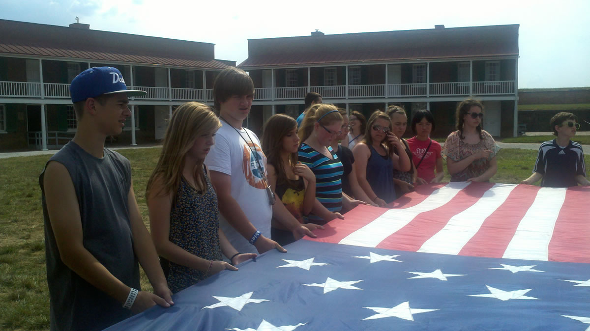Teens from Jemtegaard and Canyon Creek middle schools had the opportunity to retire the flag at Fort McHenry.