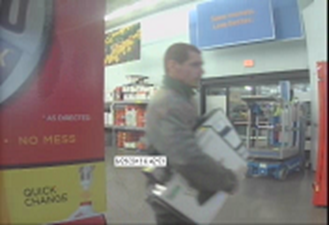 Police are looking for three suspects, including this man, in thefts of electronics from Walmart stores in Hazel Dell and Woodland.