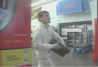 Police are looking for three suspects, including this man, in thefts of electronics from Walmart stores in Hazel Dell and Woodland.