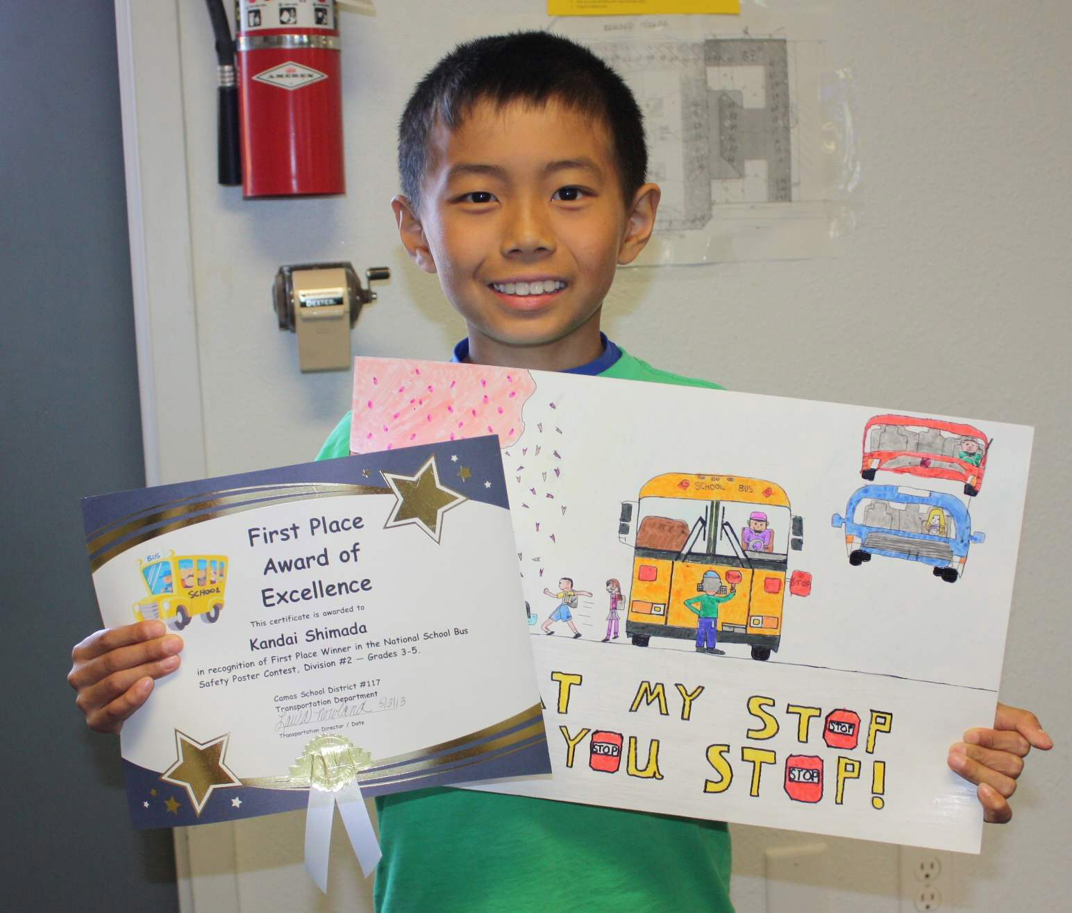 Kandai Shimada's poster promoting school bus saftey won a statewide contest, and will be judged at the national level in October.