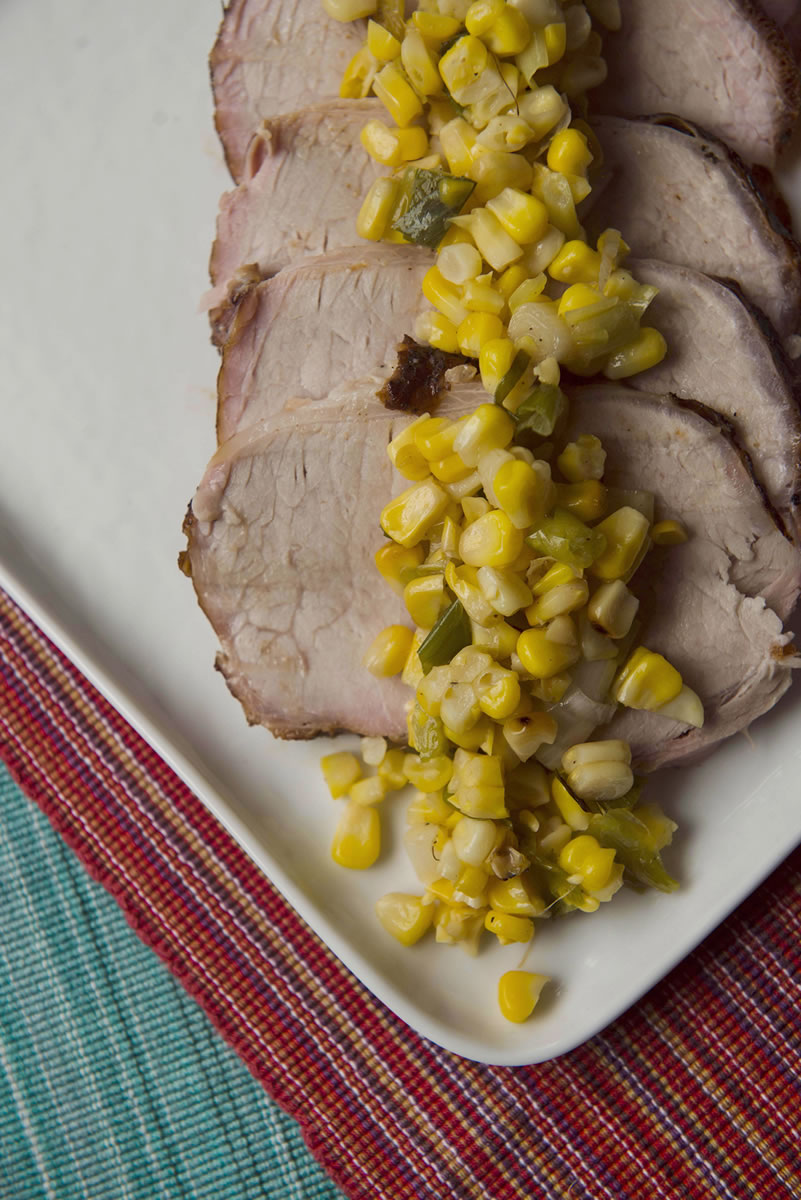 Amanda Voisard/Washington Post
Smoked Pork Loin With Corn Salad is a summer version of a hearty winter meal.