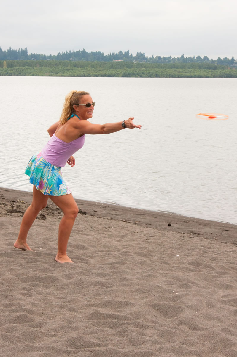 Sherri McMillan plays frisbee, a fun way to work different muscles.