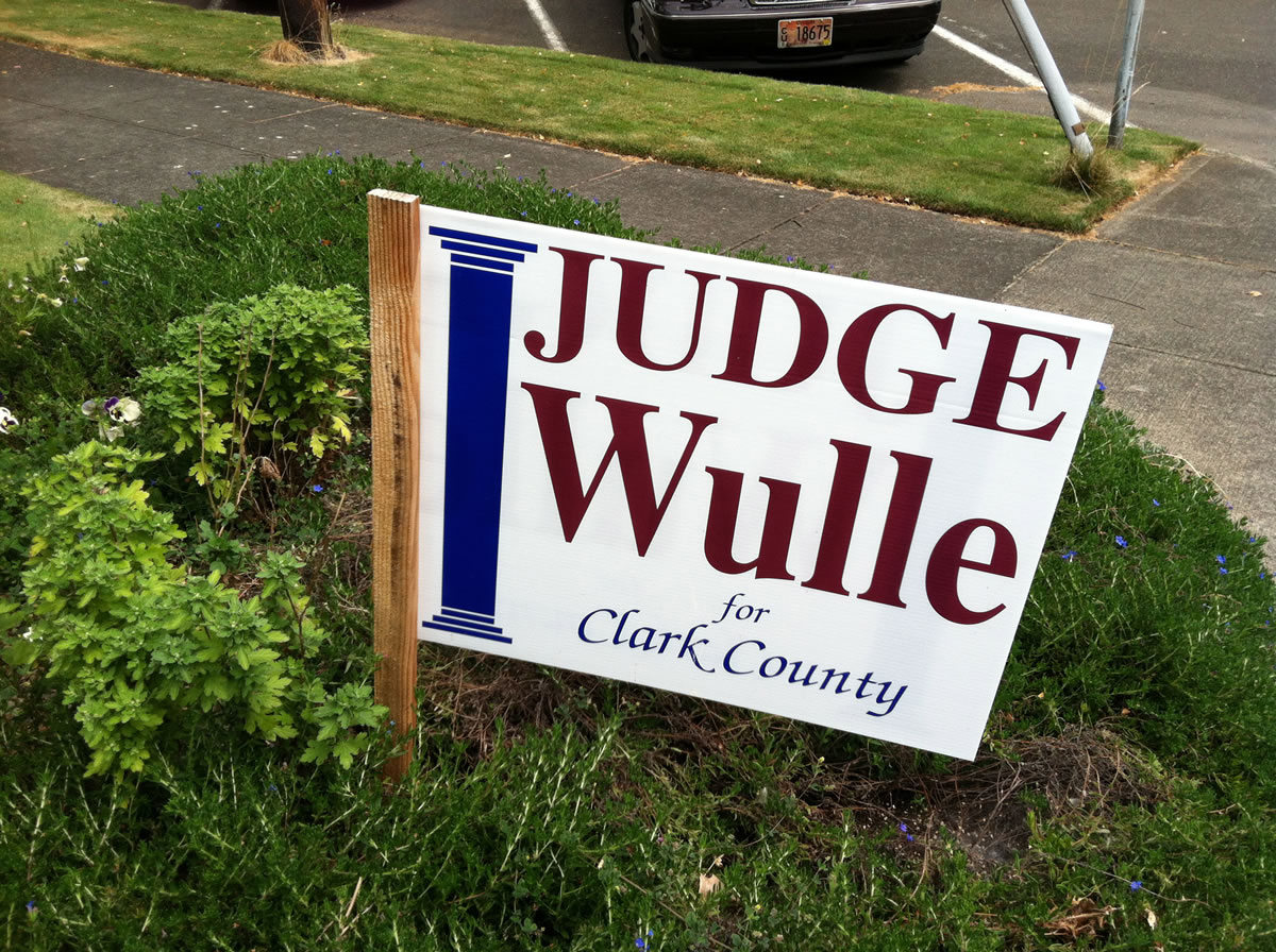 A campaign sign for Clark County Superior Court Judge John Wulle.