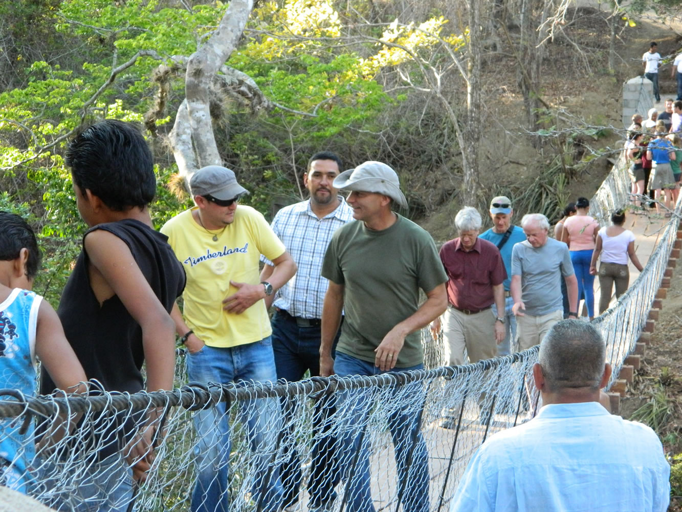 Doug Effinger, center, helps inaugurate a new pedestrian bridge in Nicaragua.