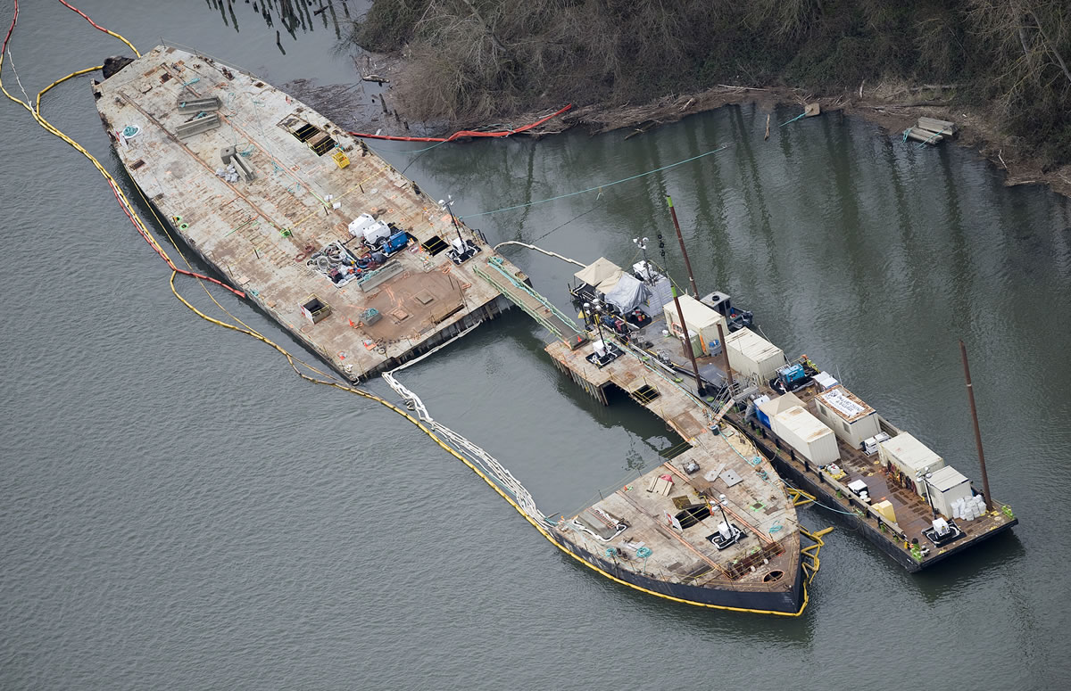 The Davy Crockett barge, shown in March 2011, spurred a $22 million cleanup effort on the Columbia River.