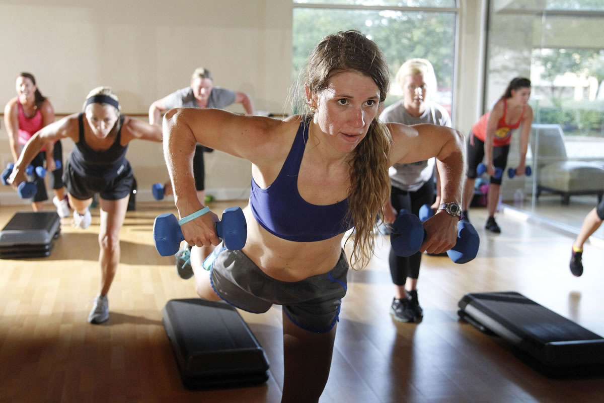 Christina Breeding works hard during a high-intensity interval training class in Lexington, Ky.