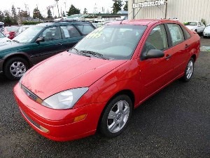 Police are looking for the driver associated with a red Ford Focus, similar to the one pictured.