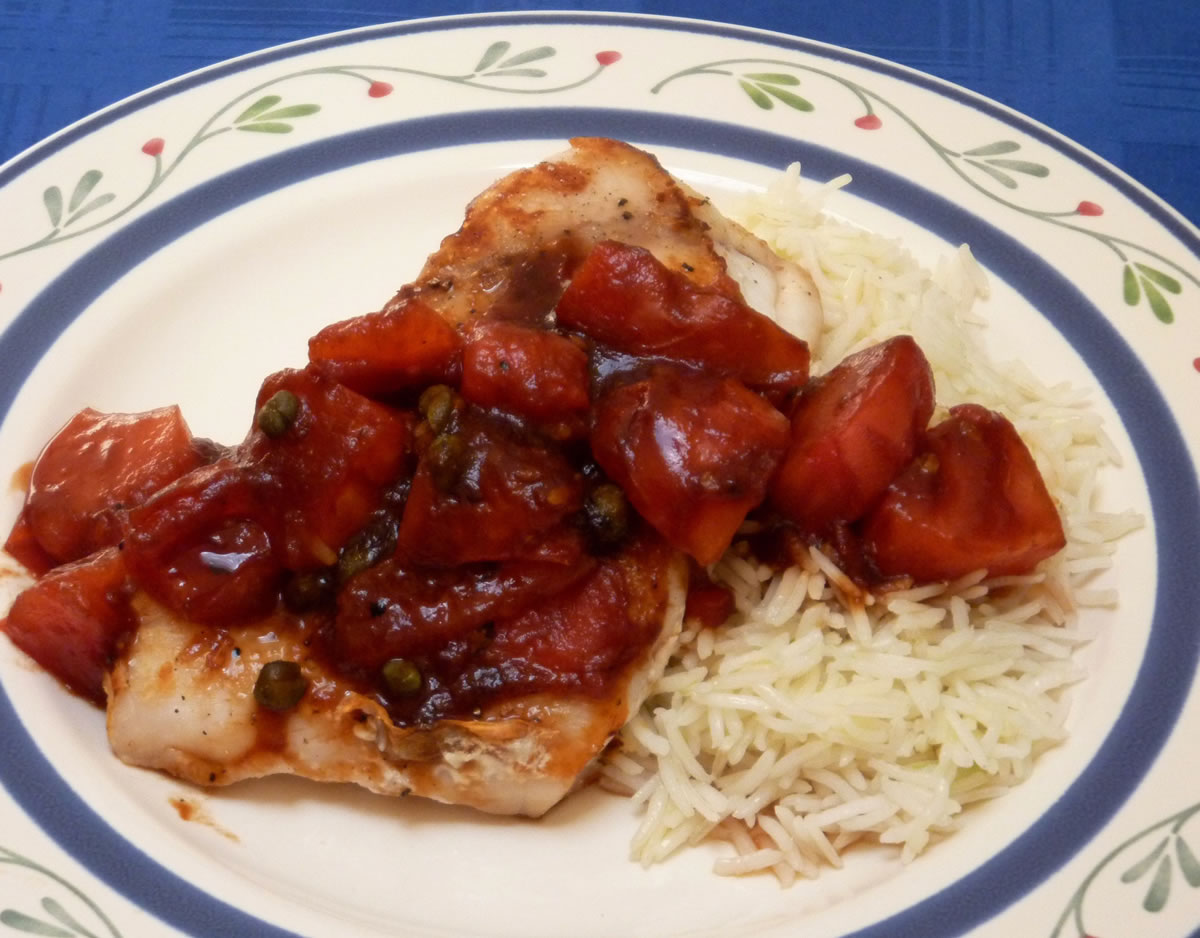 This grouper with tomatoes, capers and sweet and sour sauce has an unusual ingredient -- ketchup.