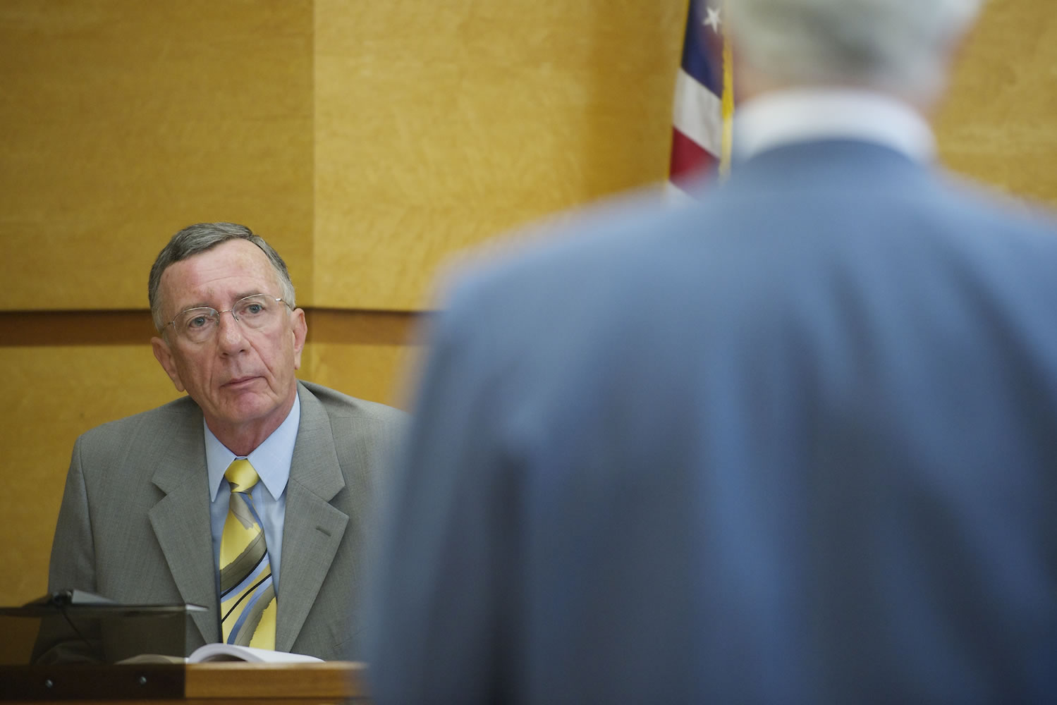 Steven Reisler, disciplinary council, asks questions of Judge John Wulle during a judicial conduct hearing Aug.