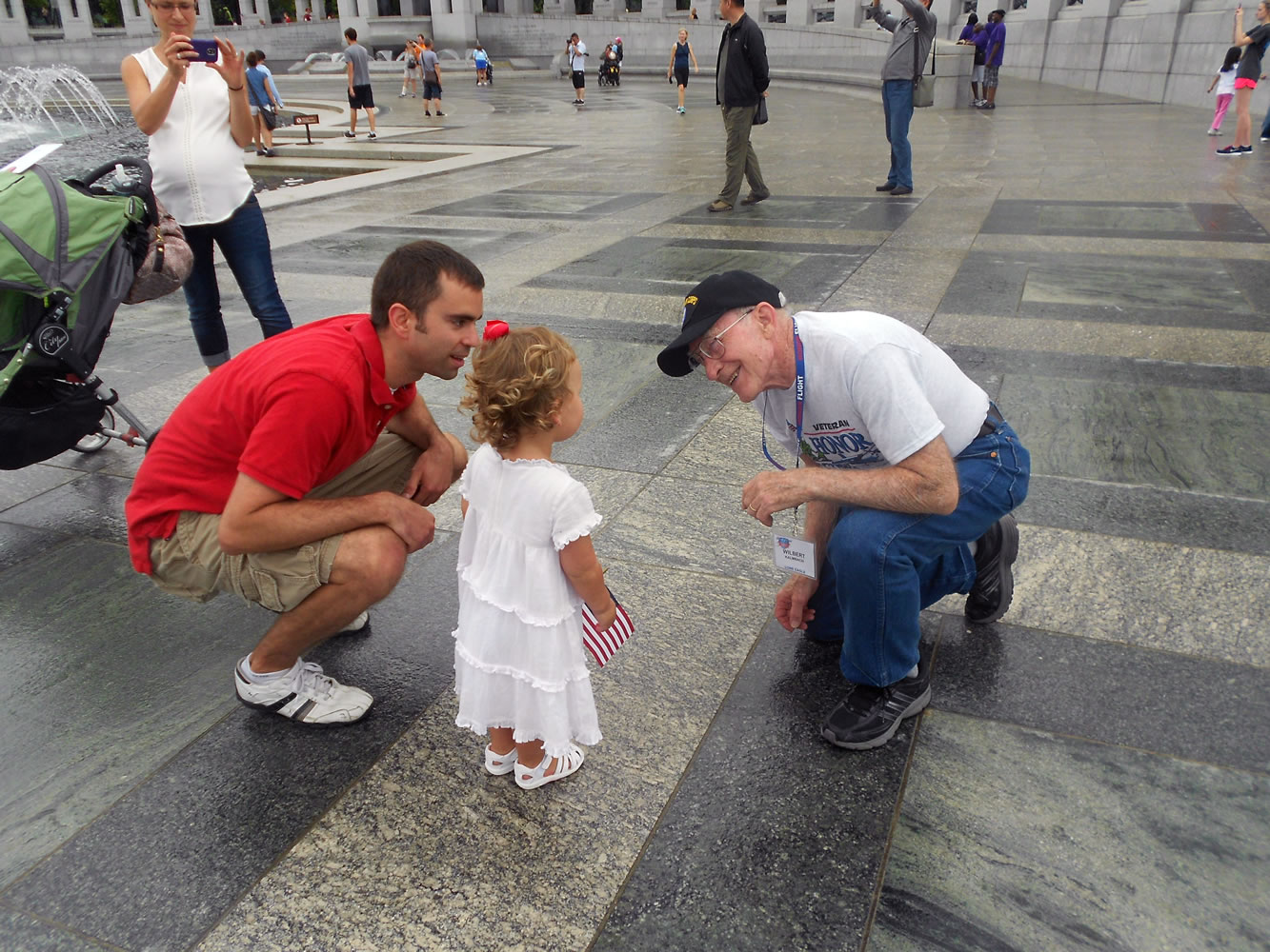 Wilbert Kalmbach, a World War II veteran, encountered a 2-year old girl with her parents at the WWII Memorial, in Washington, D.C.