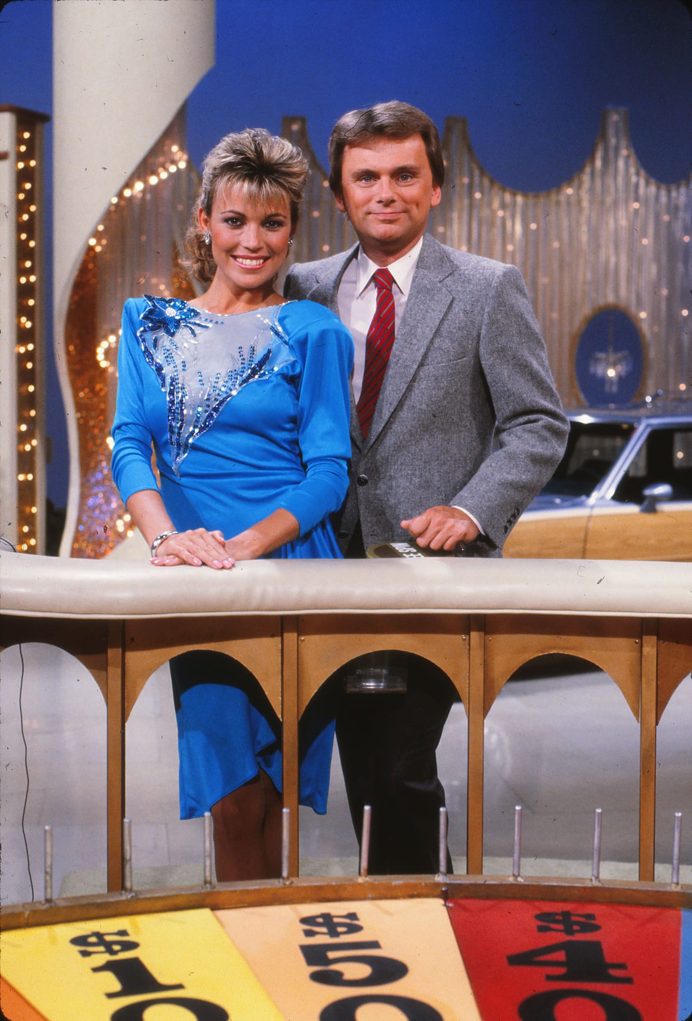 Vanna White, seen with &quot;Wheel of Fortune&quot; host Pat Sajaki in 1986. White has been with the game show for 30 years. Illustrates VANNA (category e), by Katherine Boyle (c) 2013, The Washington Post. Moved Wednesday, Sept. 11, 2013.