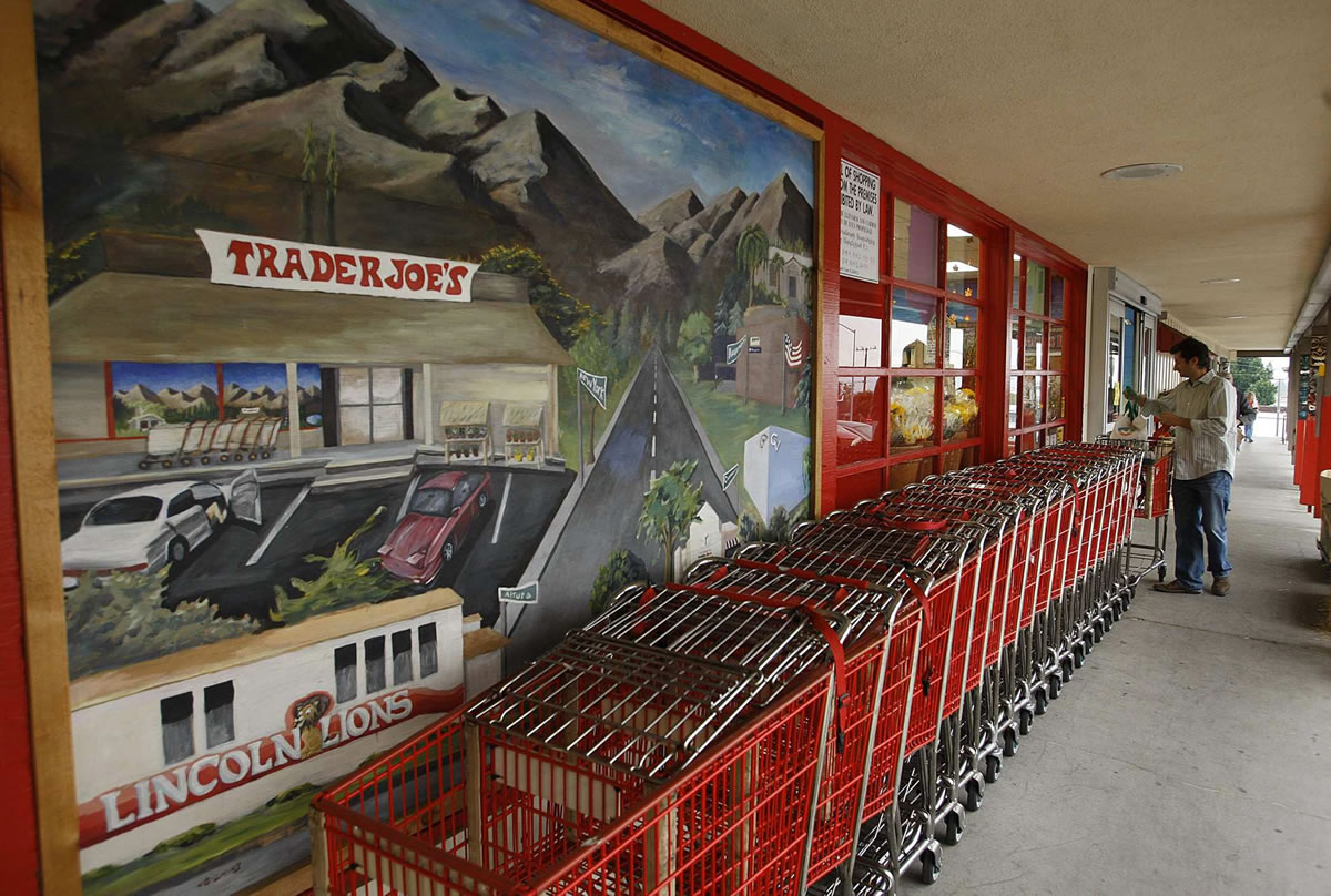 Carts are lined up at a Trader Joe's store in La Crescenta, Calif. The chain said it will end health benefits for part-time employees as of Jan.