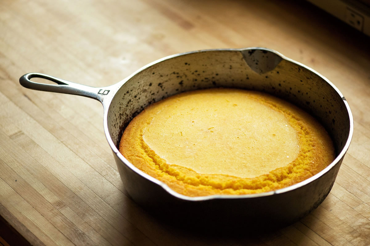 Pour mixture into the hot skillet and bake until top begins to crack and edges are golden brown, 20 to 22 minutes.