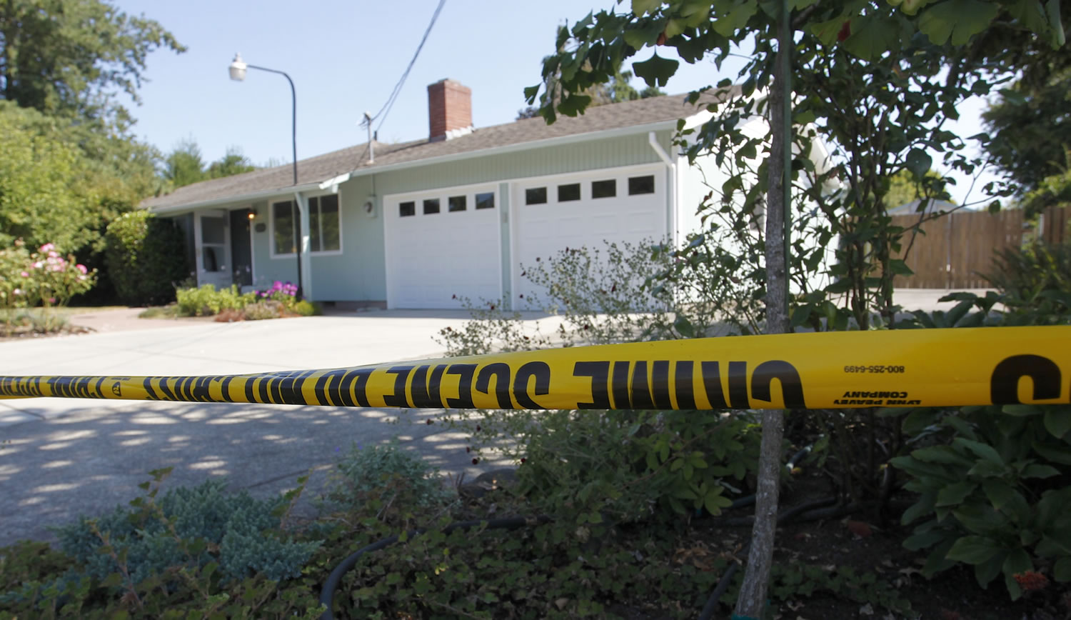 Crime scene tape frames an east Minnehaha home on Aug. 25 after an intruder was shot and killed.
