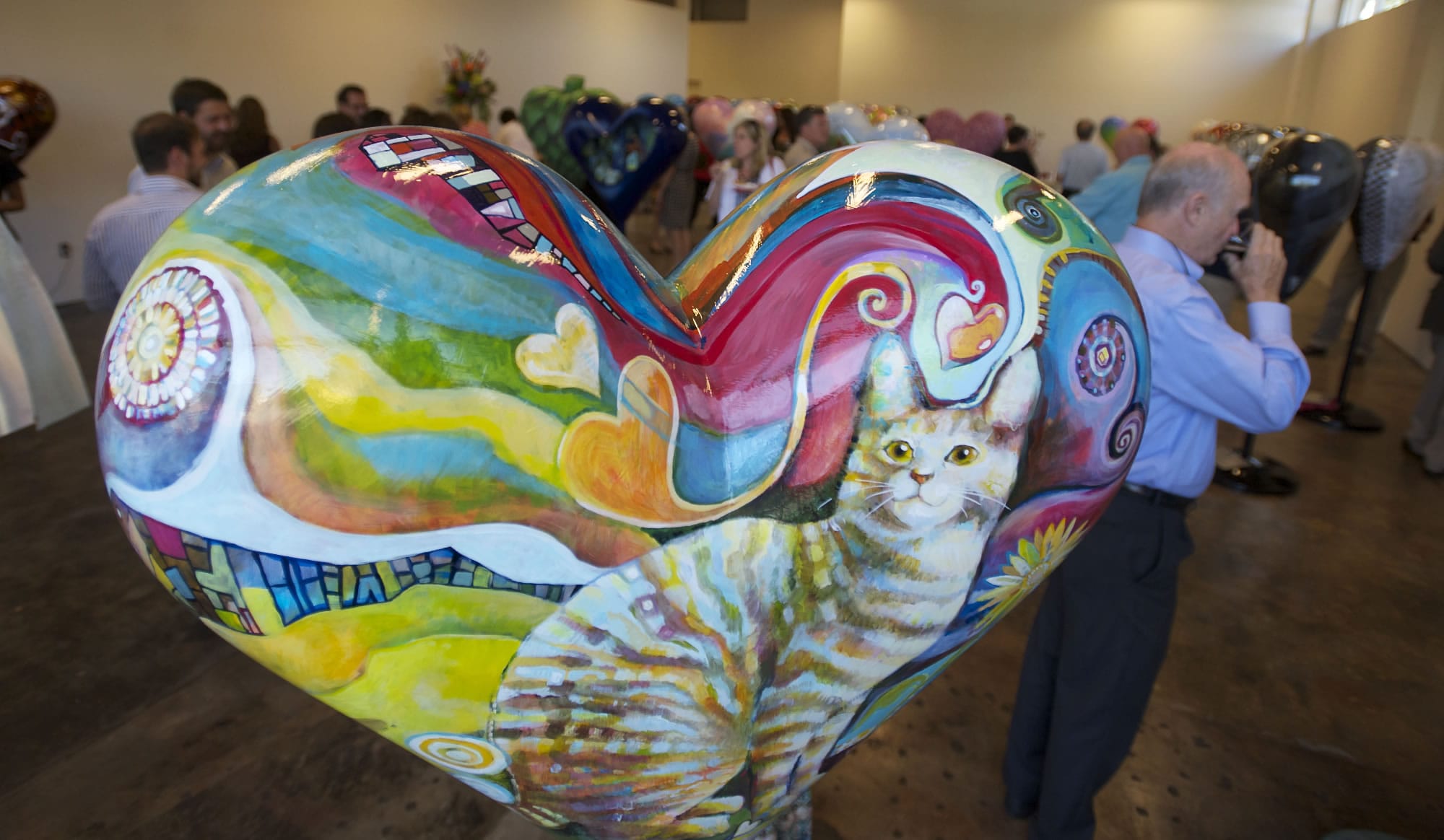 Super-Cat-A-Licious by artist Amelia Opie was one of the first heart statues to greet visitors during an artist reception for The Beat Goes On - HeArts of Clark County fundraising campaign in July.