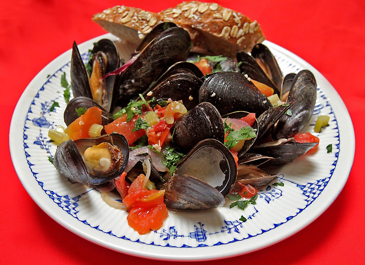 Mussels in Garlic Tomato Broth is an easy and inexpensive recipe to make.