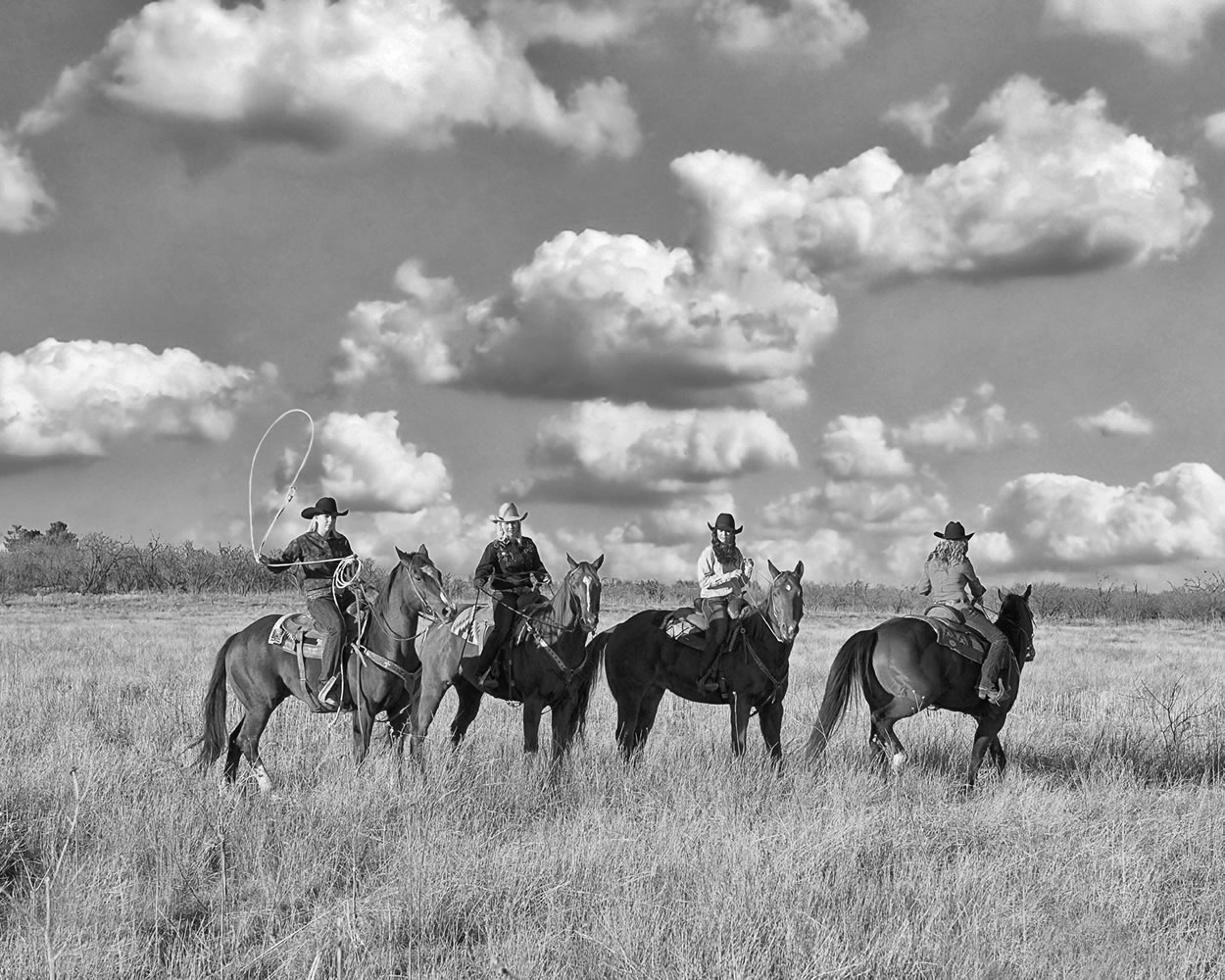 A photograph taken by Lara Blair features four women enrolled in an equine program in west Texas.